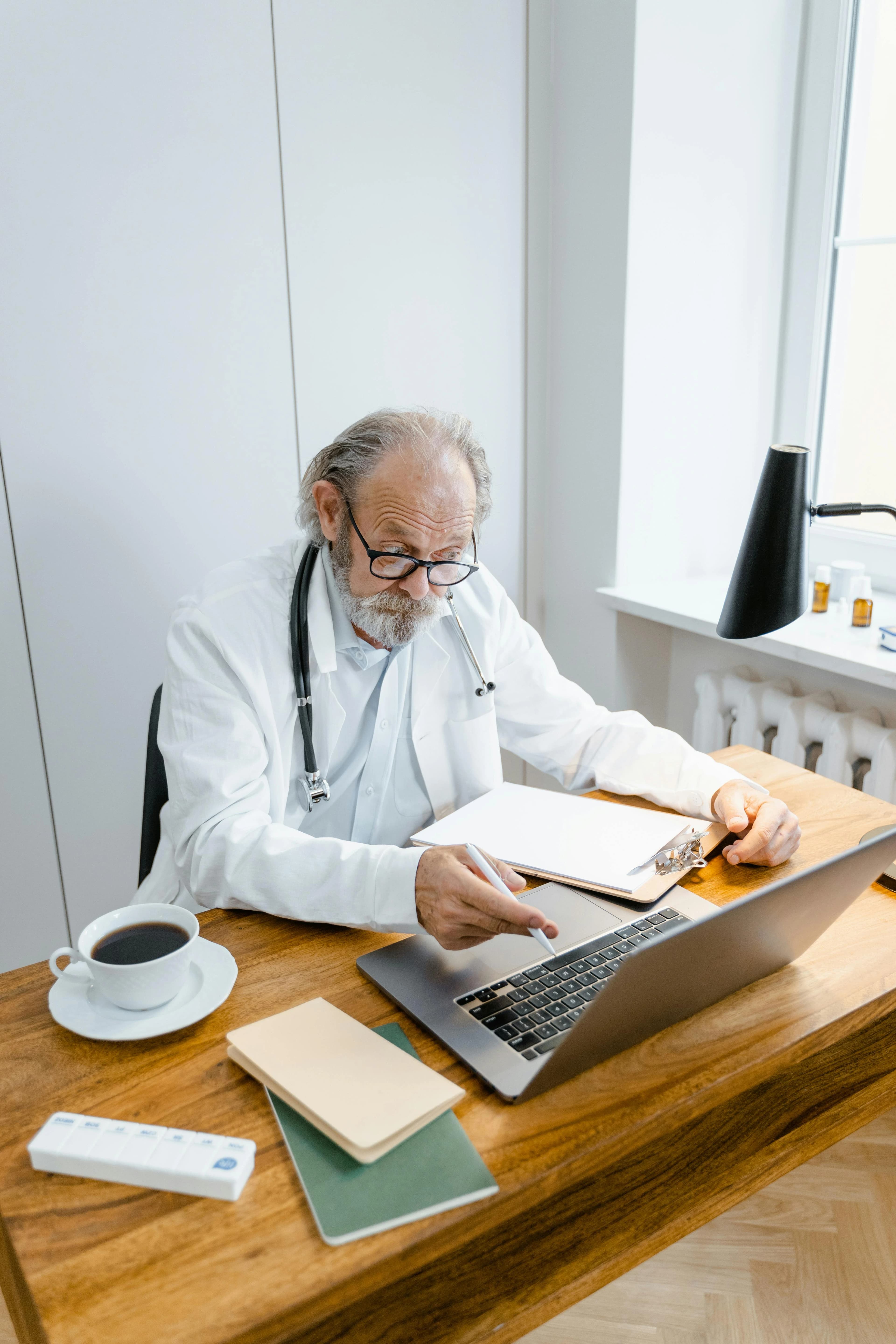 Clinical staff working with patient records and lab reports