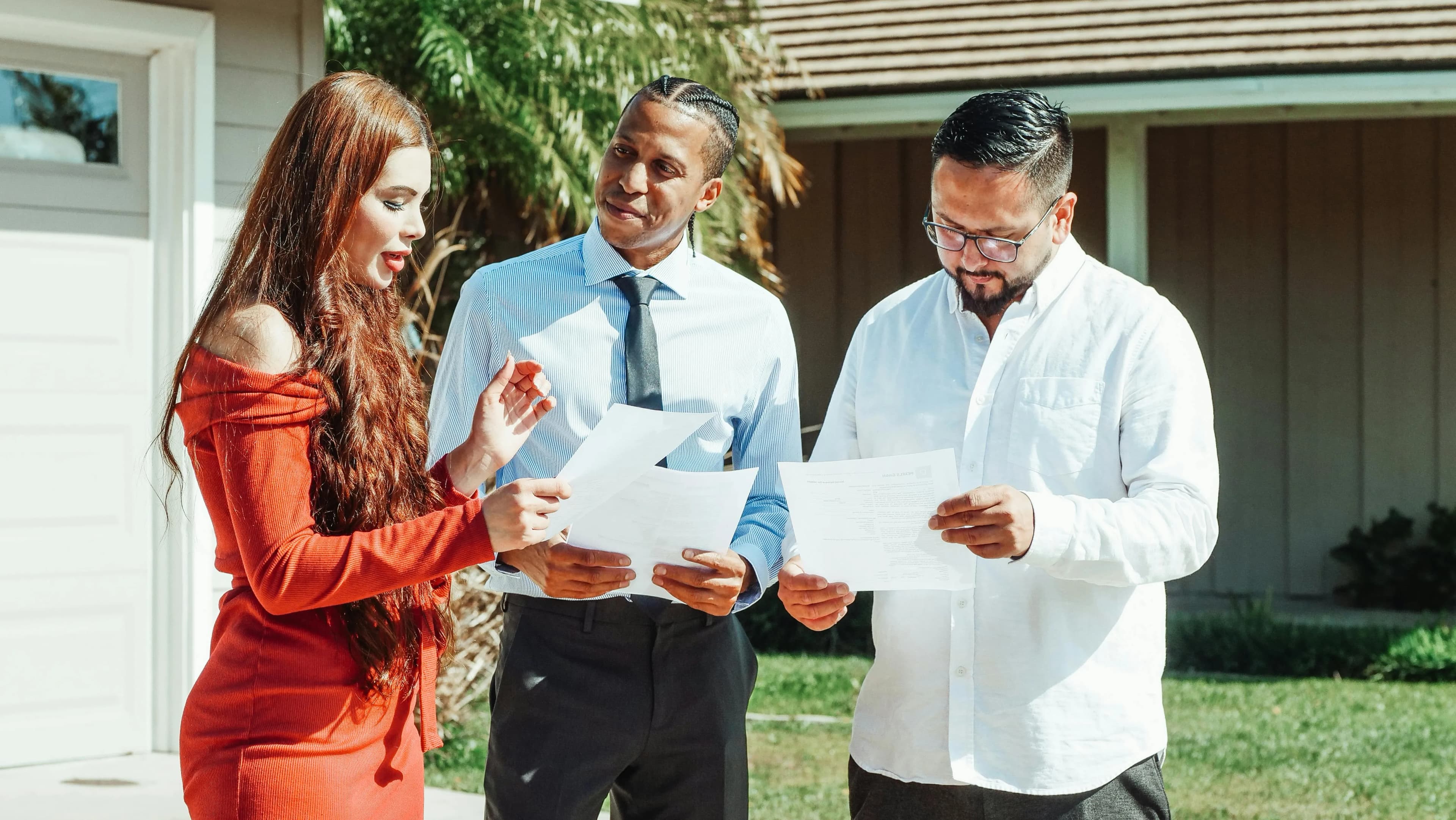 Real estate professional reviewing deeds and appraisals